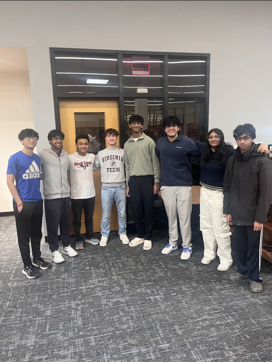 The academic team stands together for a group photo after a long and hard-fought competition. 
Photo courtesy of Aryan Manik
